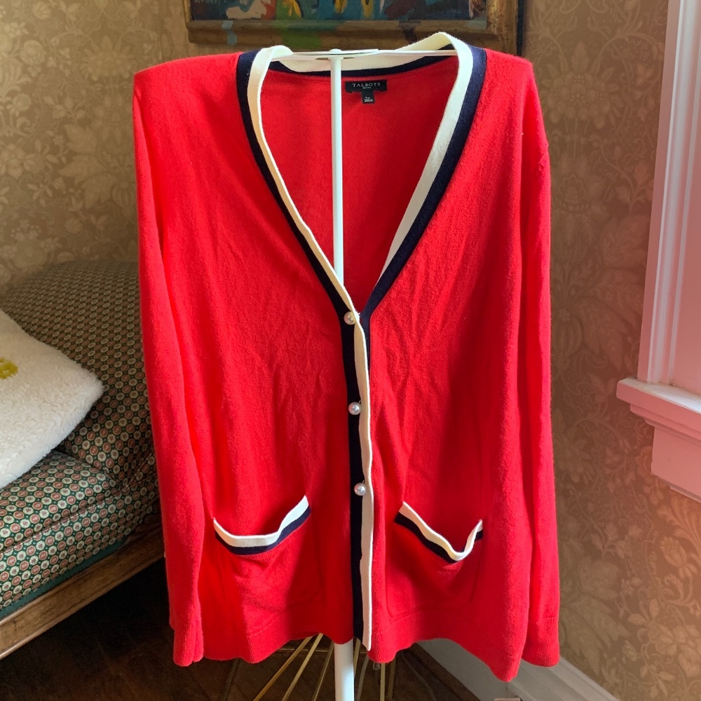 Talbots “collegiate” style cardigan with huge Pearl buttons. Worn a few rimes